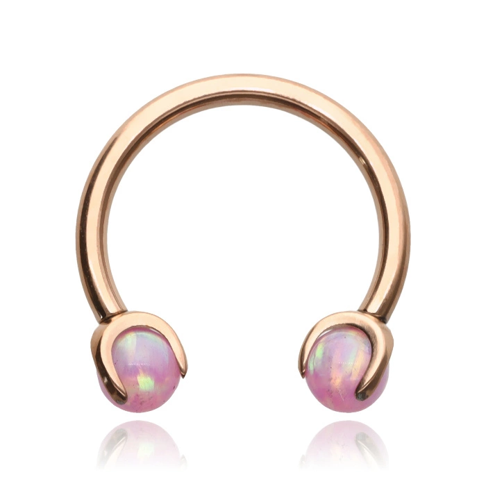 Titanium horseshoe earring in rose gold with purple opal - TKP-004