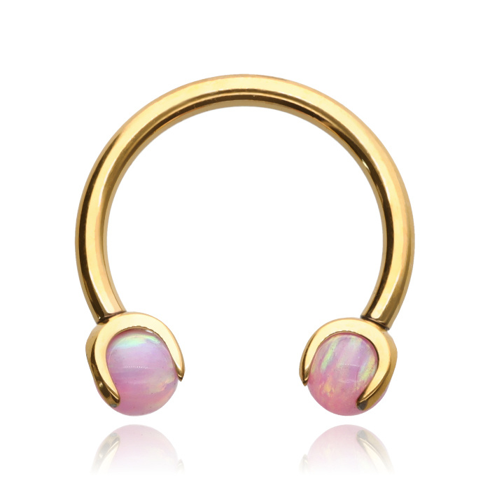 Titanium horseshoe earring in rose gold with pink opal - TKP-004