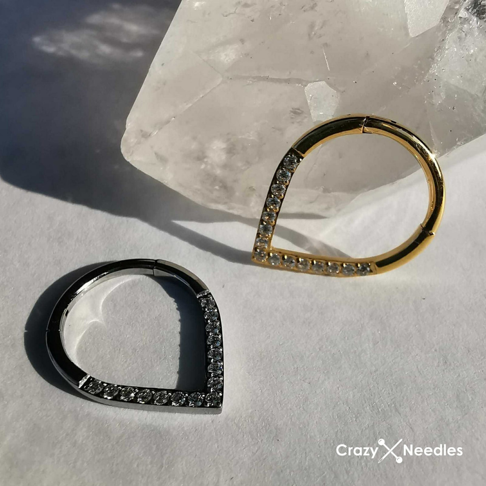 Titanium piercing clicker with white zircons - gold - TK-057